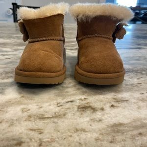 Ugg boots with flower closure